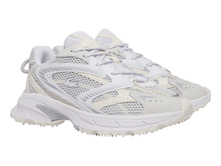 Tenis deportivos Lacoste Neo Shot en color blanco y blanco roto con diseño de malla y suela robusta.