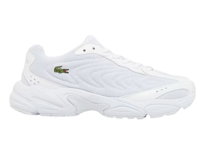 Tenis deportivos Lacoste color blanco con suela ancha y diseño moderno en malla sintética.