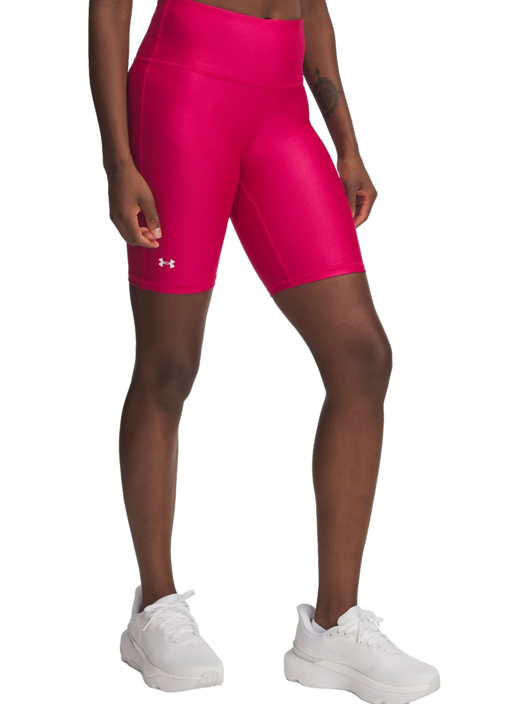 Shorts deportivos ajustados de color fucsia para mujer de la marca Under Armour.