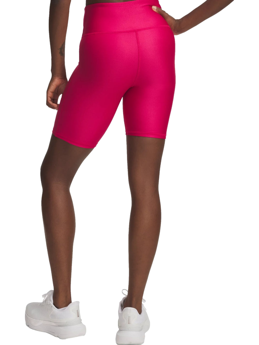 Shorts deportivos ajustados de color fucsia para mujer de la marca Under Armour.