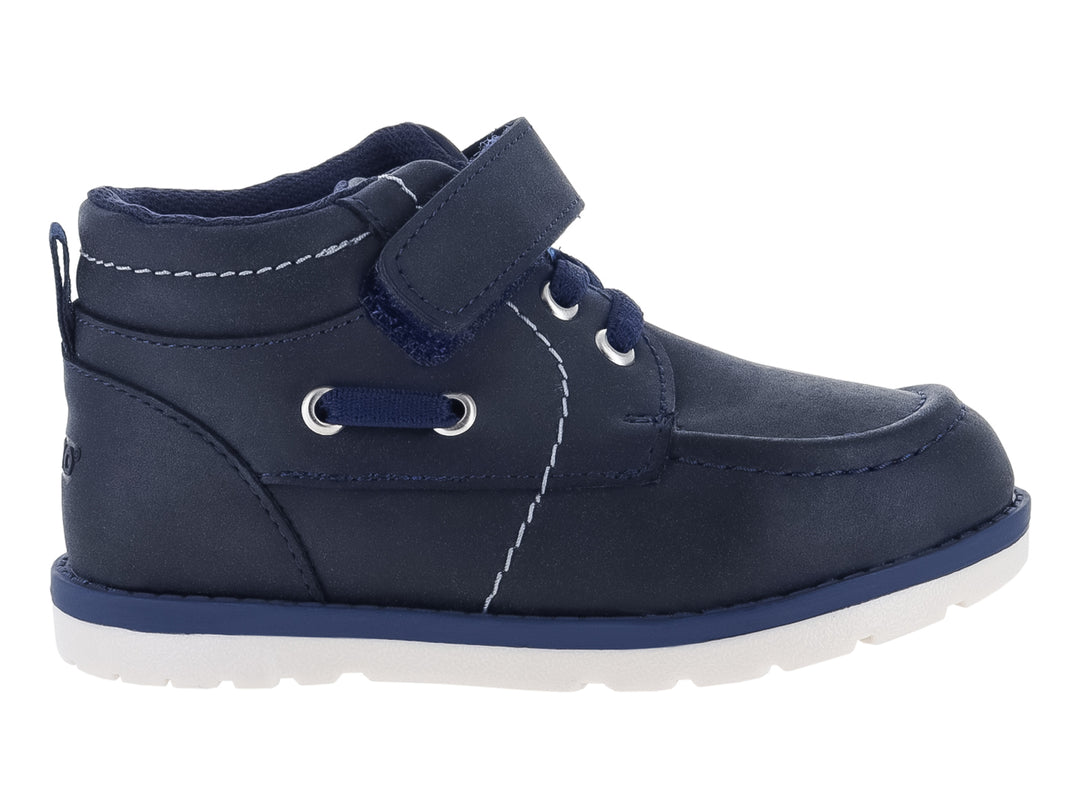 Zapato infantil VAVITO color azul marino con cierre de velcro y suela blanca.