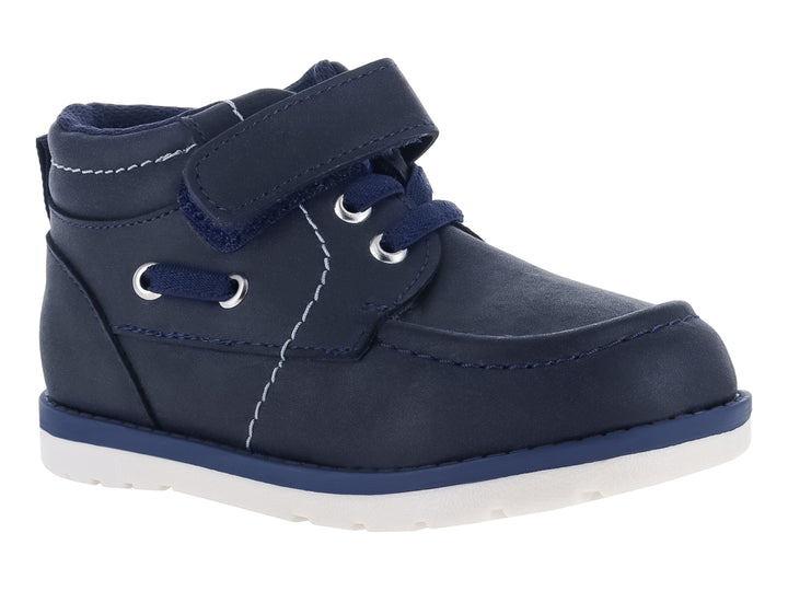 Zapato infantil VAVITO color azul marino con cierre de velcro y suela blanca.