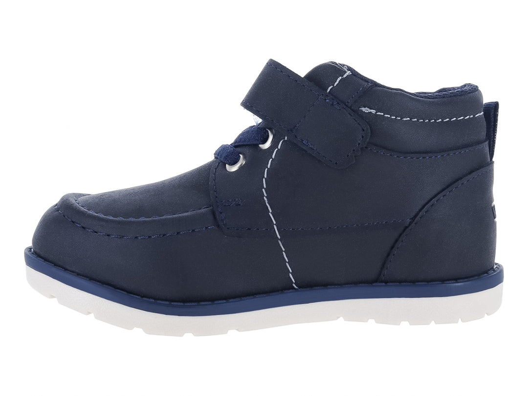 Zapato infantil VAVITO color azul marino con cierre de velcro y suela blanca.
