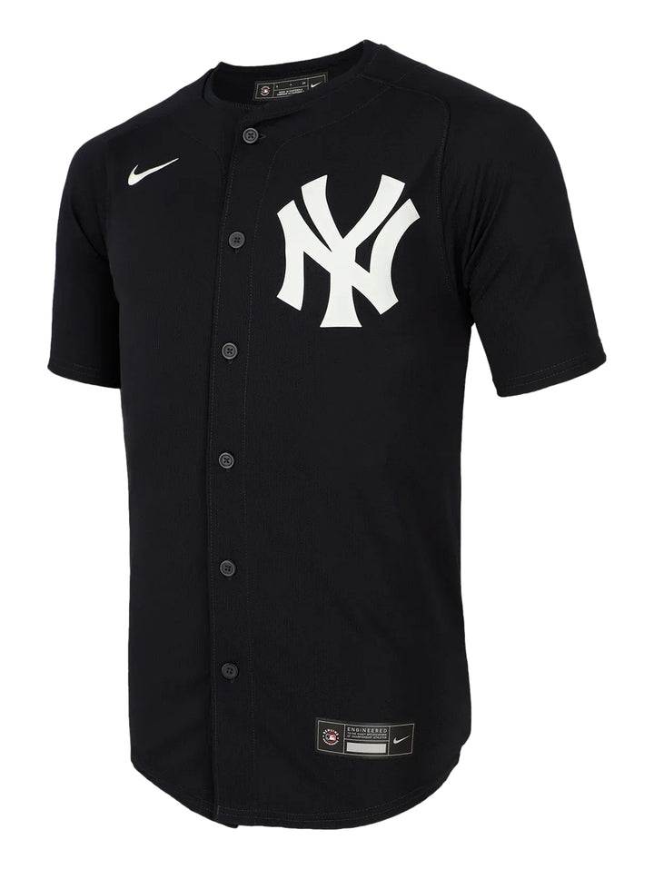 Jersey de béisbol Nike color negro con logotipo de los New York Yankees en blanco y botones frontales.