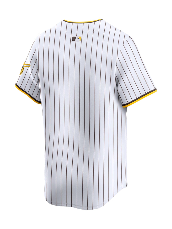 Jersey de béisbol Nike de los San Diego Padres en color blanco con rayas marrones y letras amarillas.