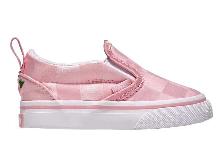 Zapato VANS slip-on color rosa con patrón de cuadros y suela blanca.
