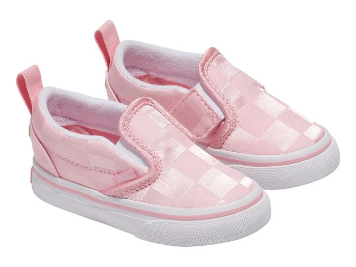Zapato VANS slip-on color rosa con patrón de cuadros y suela blanca.