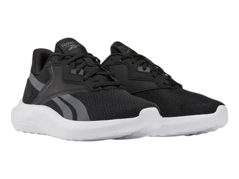 Tenis deportivos Reebok Energen Lux en color negro con suela blanca y detalles en gris.