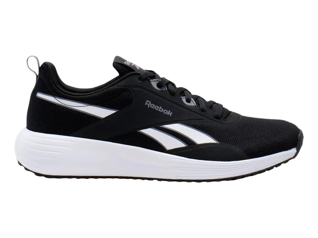 Tenis deportivos Reebok color negro con suela blanca y detalles laterales blancos.