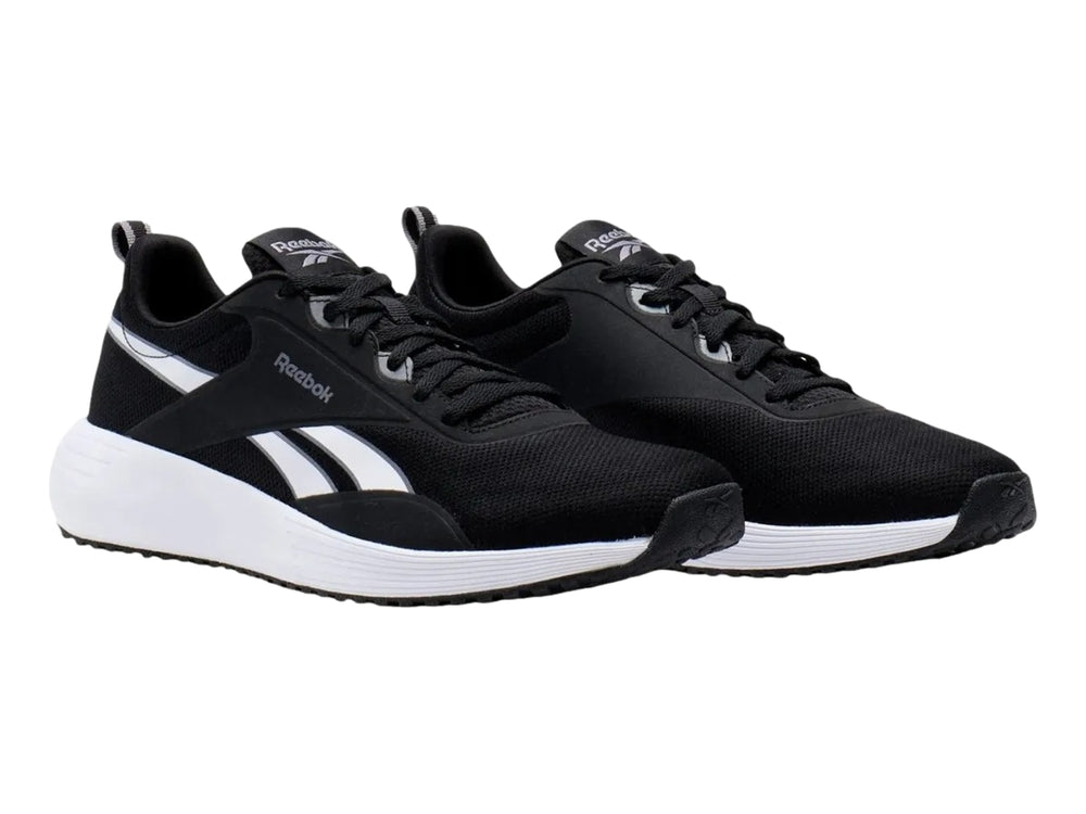 Tenis deportivos Reebok color negro con suela blanca y detalles laterales blancos.