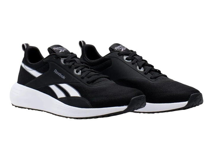 Tenis deportivos Reebok color negro con suela blanca y detalles laterales blancos.