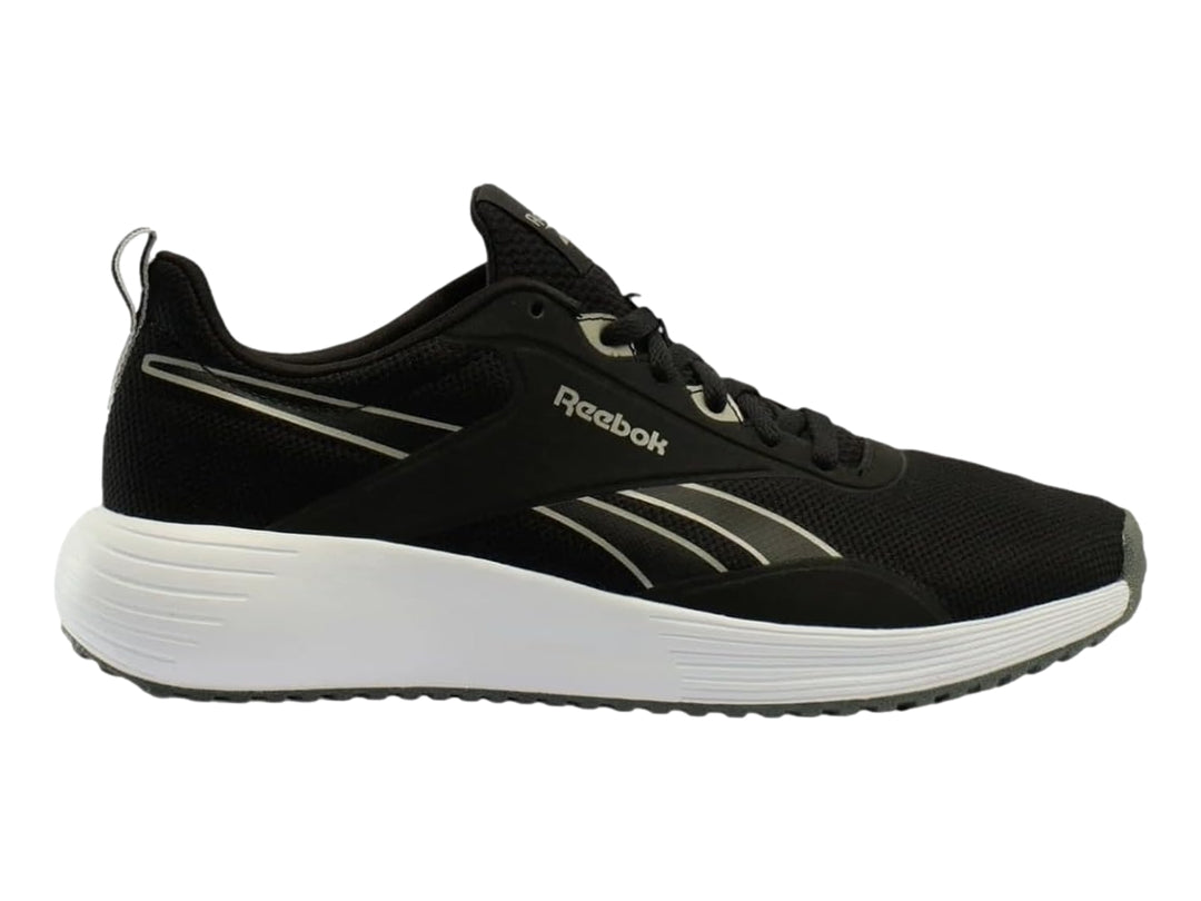 Tenis deportivos Reebok color negro con suela blanca y detalles en plata.
