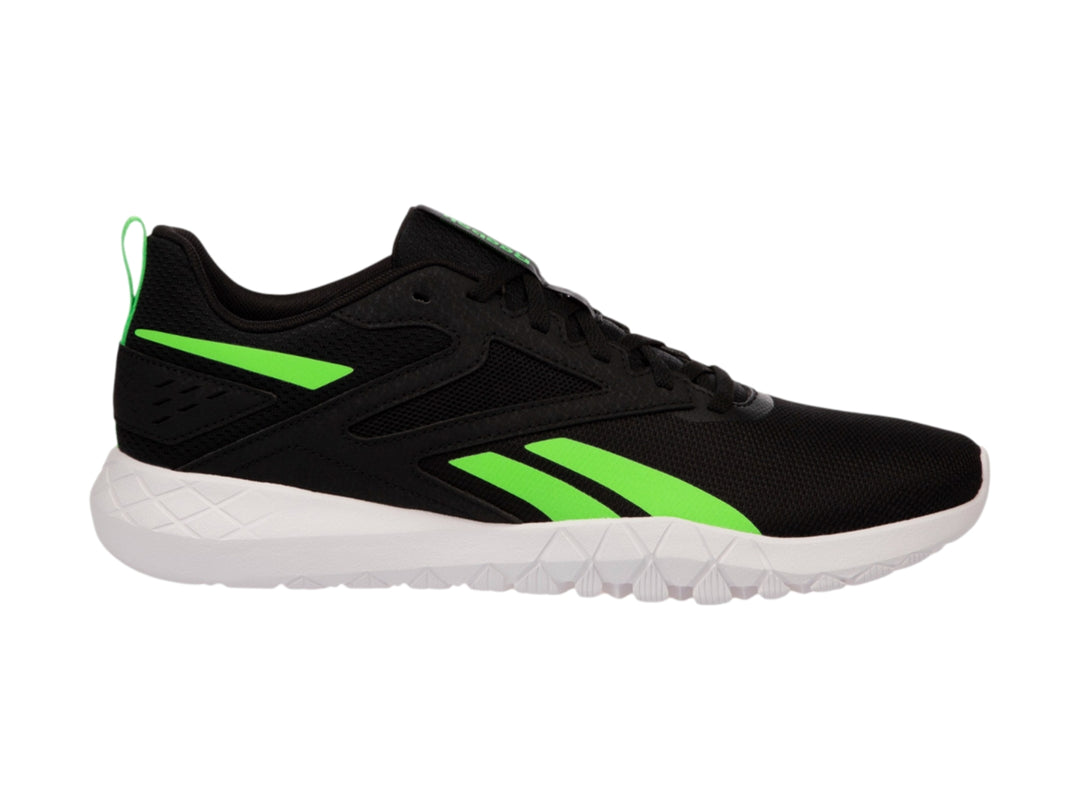 Tenis deportivos Reebok color negro con detalles en verde lima y suela blanca.