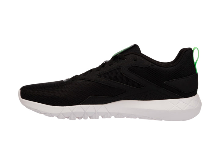 Tenis deportivos Reebok color negro con detalles en verde lima y suela blanca.