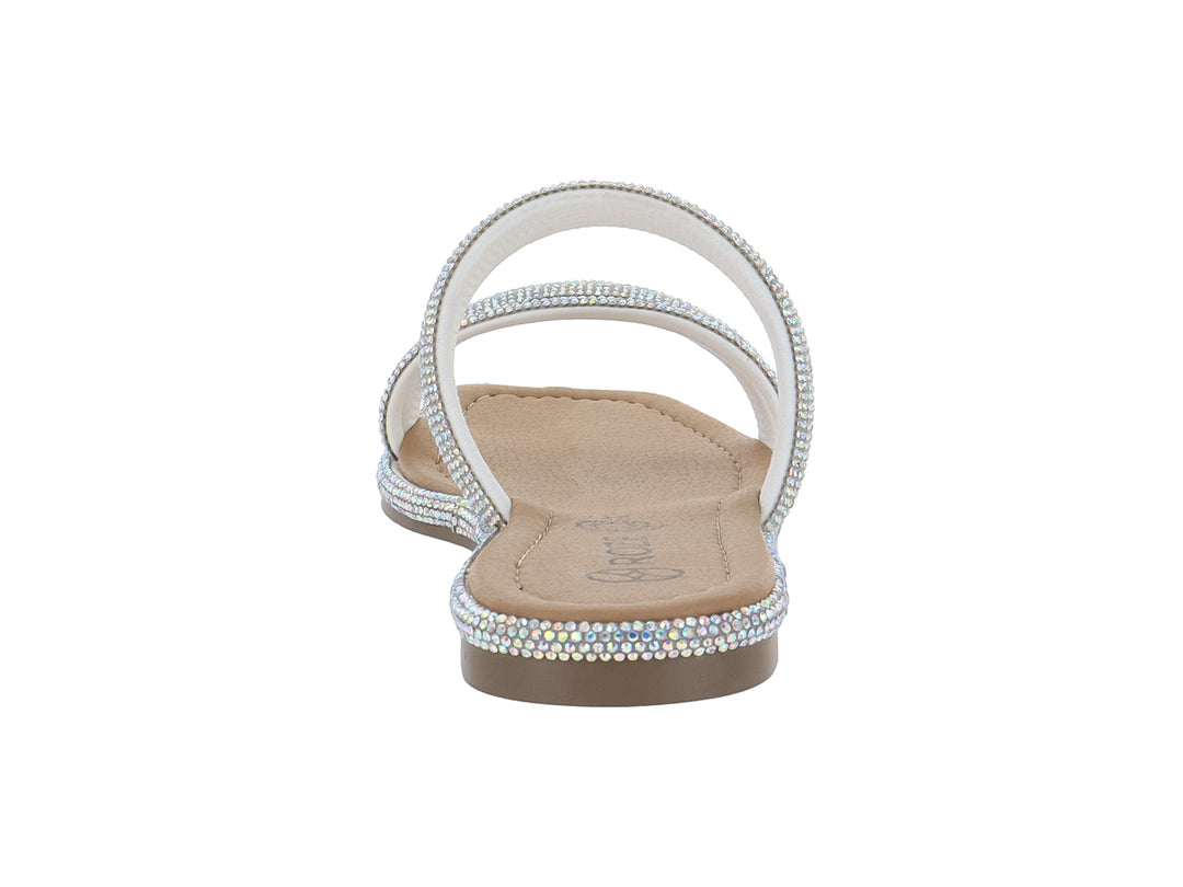 Sandalias planas color tornasol con tiras y bordes decorados con cristales brillantes.