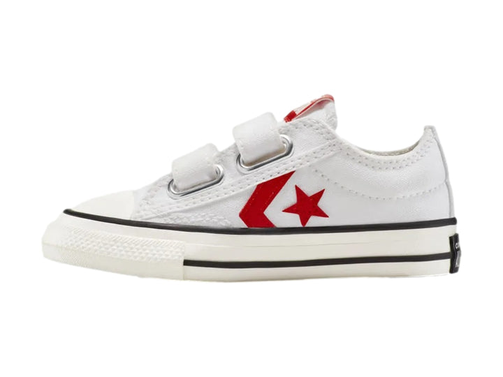 Tenis Converse blancos con cierre de velcro y logotipo de estrella roja.