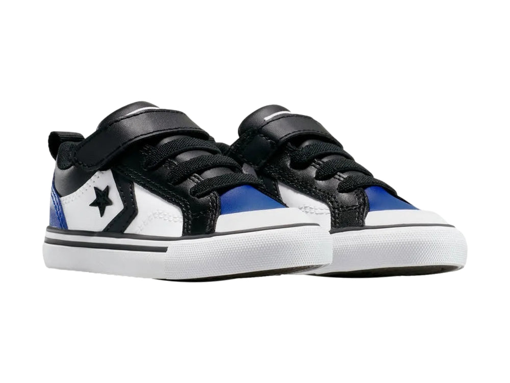 Tenis Converse Pro Blaze para niño en colores blanco, azul y negro con cierre de correa de velcro.