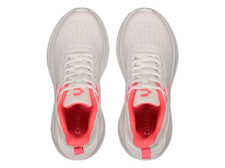 Tenis deportivos Charly color blanco con detalles en rosa, diseño ligero y moderno.