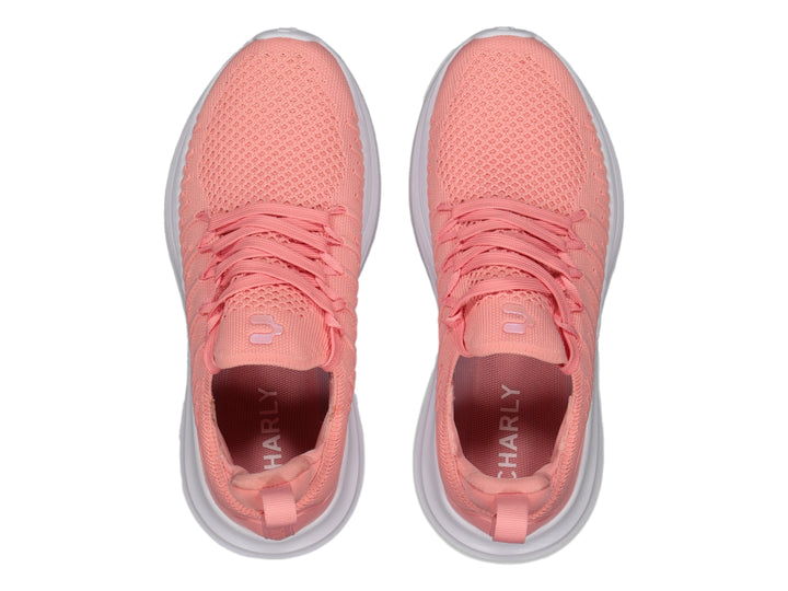 Tenis deportivos Charly color rosa con suela blanca y tejido transpirable.