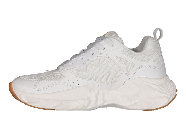 Tenis deportivos Charly blancos con detalles dorados y suela color caramelo.