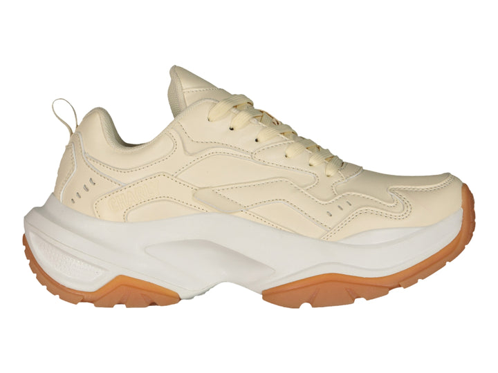 Tenis deportivos Charly color beige con suela ancha en tono café y blanco.