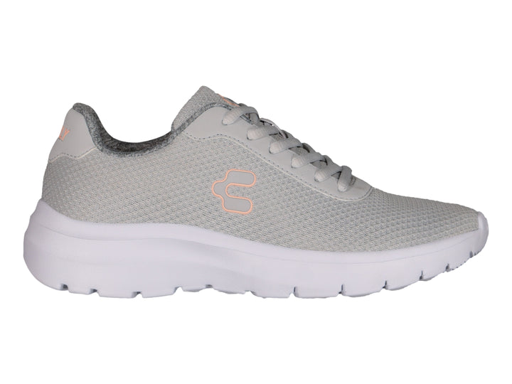 Tenis deportivos Charly color gris con suela blanca y tejido de malla.