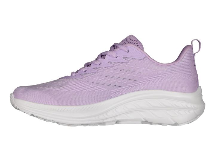 Tenis deportivos Charly de color lila con suela blanca, vista lateral.