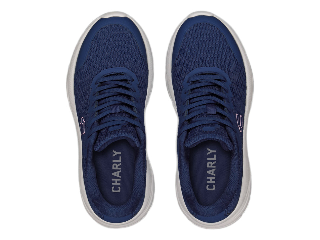 Tenis deportivos Charly color azul marino con suela blanca y detalle en rosa.