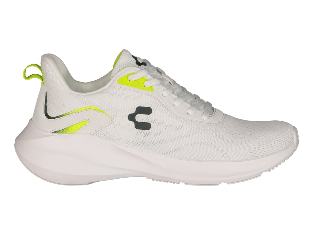 Tenis deportivos Charly color blanco con detalles en verde lima y suela blanca.