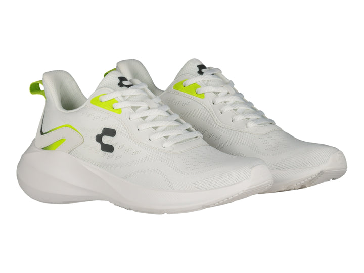 Tenis deportivos Charly color blanco con detalles en verde lima y suela blanca.