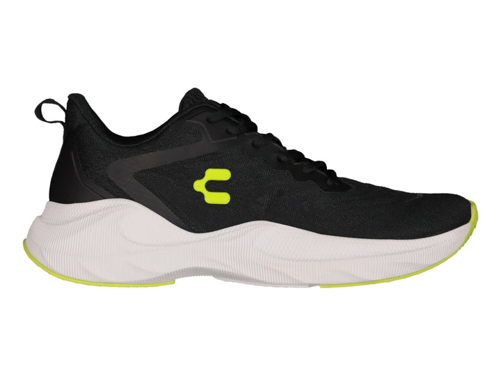 Tenis deportivos Charly en color negro con suela blanca y detalles en color lima.