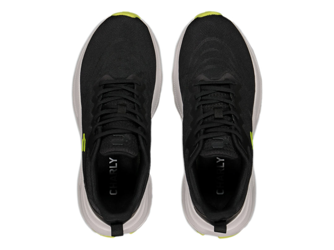 Tenis deportivos Charly en color negro con suela blanca y detalles en color lima.