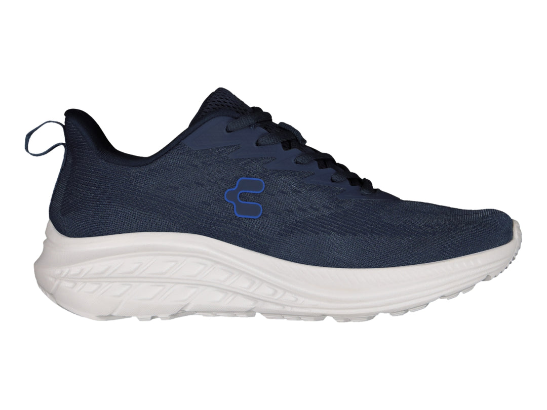 Tenis deportivos Charly color azul marino con suela blanca.