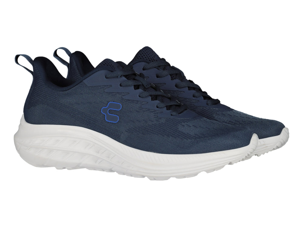 Tenis deportivos Charly color azul marino con suela blanca.