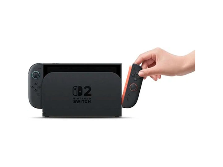Consola Nintendo Switch 2 color negro en su empaque rojo con juego Mario Kart World 2 incluido.