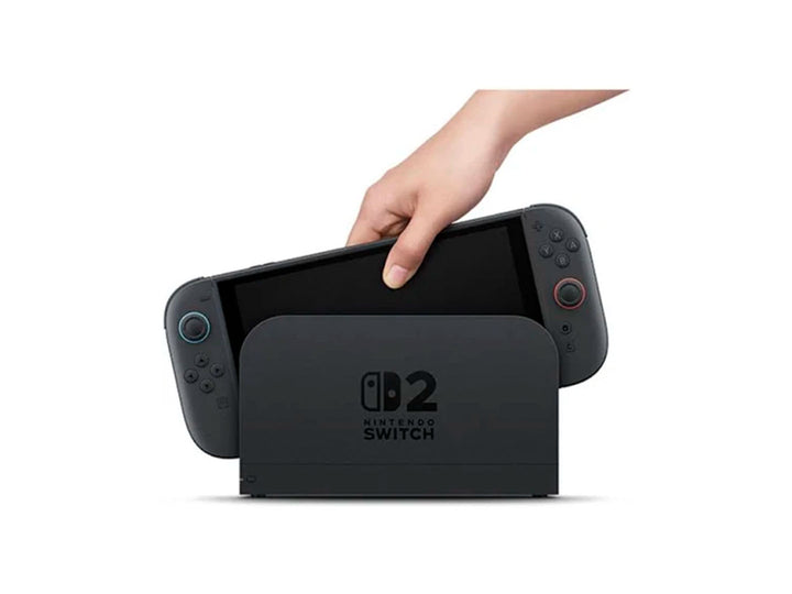 Consola Nintendo Switch 2 color negro en su empaque rojo con juego Mario Kart World 2 incluido.