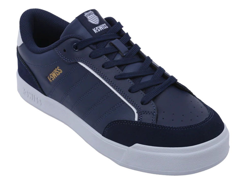 Tenis K-Swiss color azul marino con suela blanca y detalles en dorado.