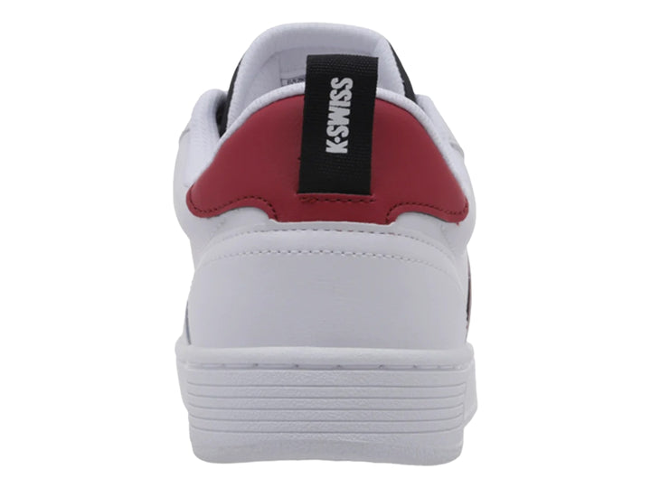 Tenis K-Swiss blancos con franjas y detalles en azul marino.