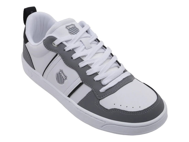 Tenis K-Swiss modelo Lozan Match en colores blanco y gris con detalles en negro y suela blanca.