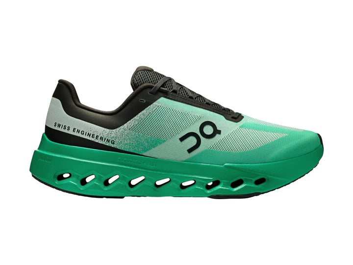 Tenis deportivos On Cloud Cloudsurfer Next en color verde menta y negro con suela amortiguada.