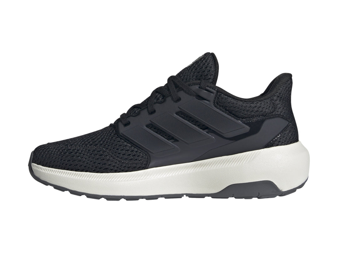 Tenis deportivos Adidas color negro con suela blanca y tejido de malla.