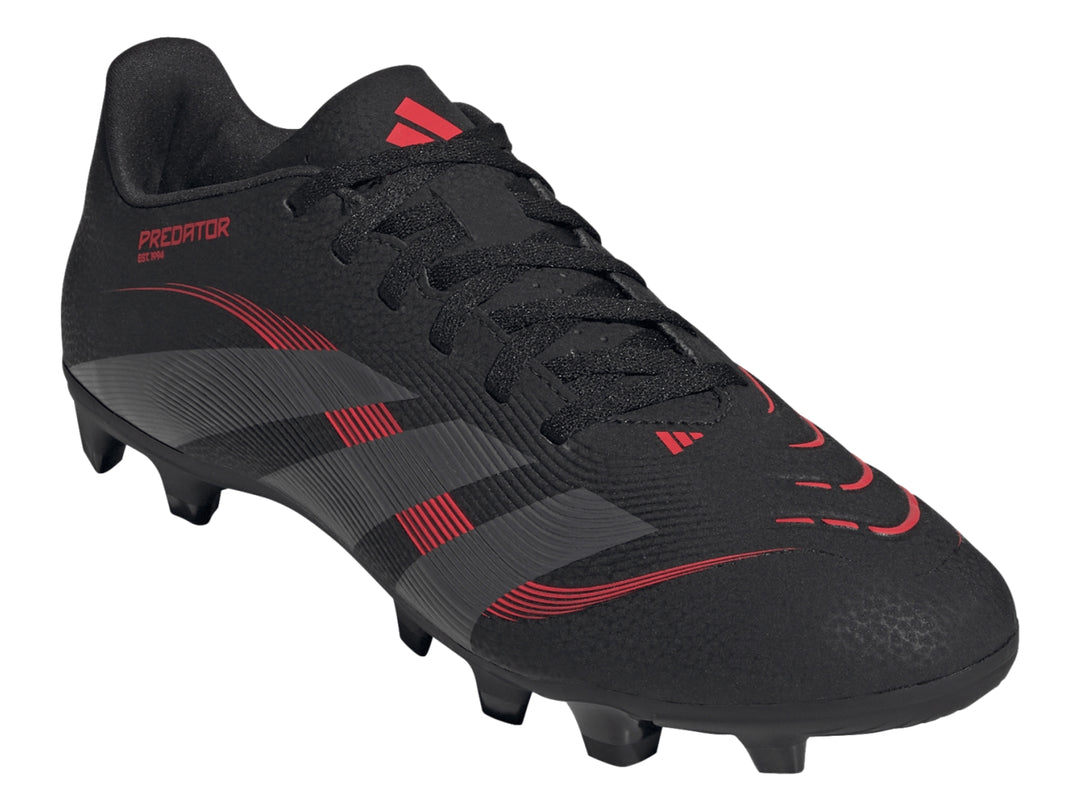 Zapato de fútbol Adidas Predator en color negro con franjas grises y detalles en rojo, vista lateral.