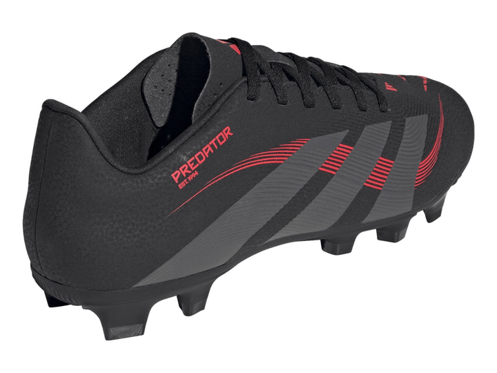 Zapato de fútbol Adidas Predator en color negro con franjas grises y detalles en rojo, vista lateral.