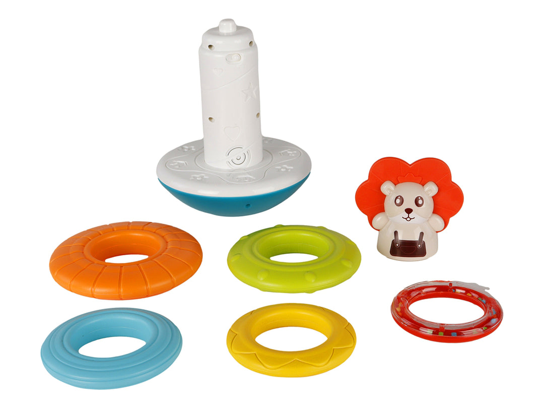 Juguete interactivo de anillos apilables multicolores con una figura de oso en la parte superior, presentado en su caja.