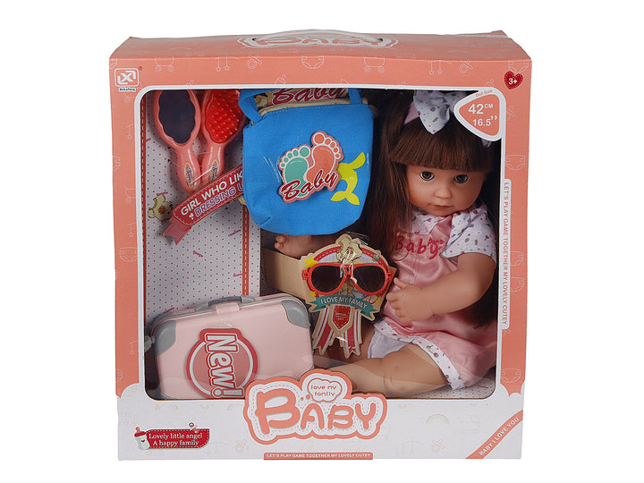 Set de muñeca KELDER TOYS con accesorios que incluyen maletín, lentes y cepillo en empaque rosa.