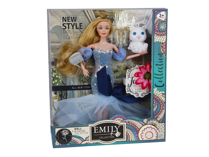 Muñeca Emily con vestido largo azul brillante y un pequeño gato blanco, presentada en su caja de empaque.