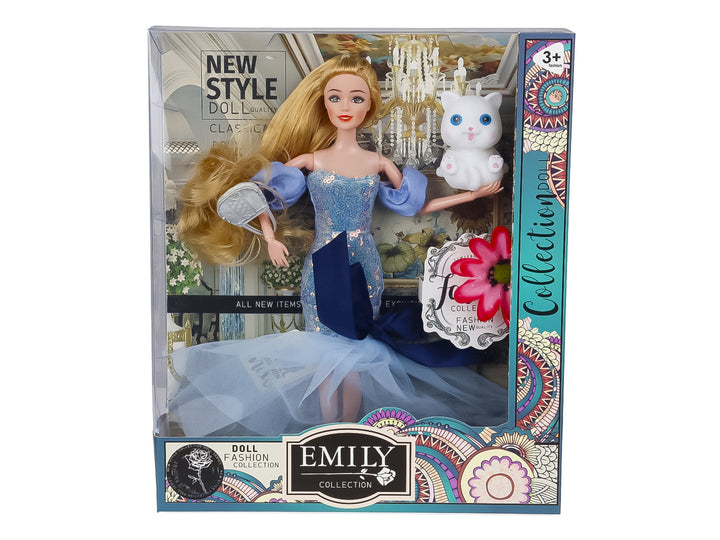Muñeca Emily con vestido largo azul brillante y un pequeño gato blanco, presentada en su caja de empaque.