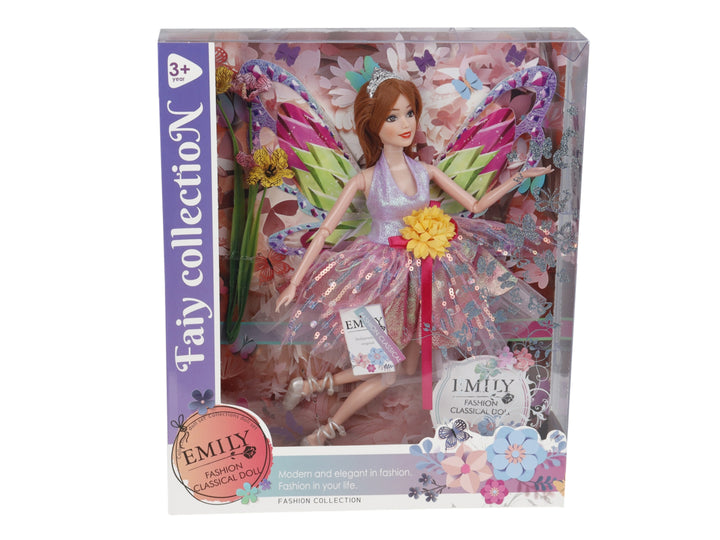 Muñeca de hada con vestido rosa y alas coloridas dentro de su caja de empaque.