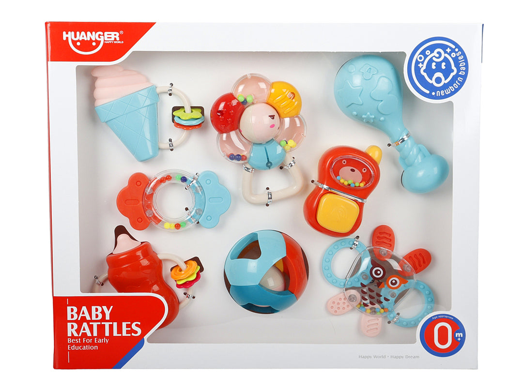 Set de sonajeros y juguetes didácticos multicolores para bebé en caja blanca.