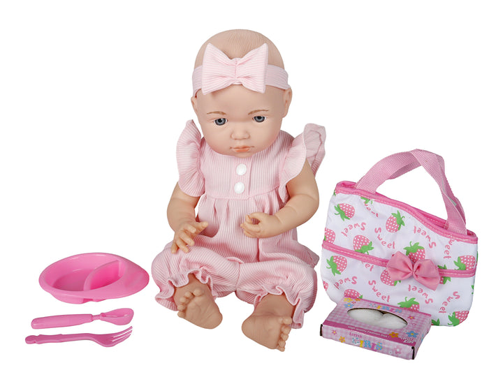 Muñeca bebé con ropa y accesorios en color rosa dentro de su caja de empaque.